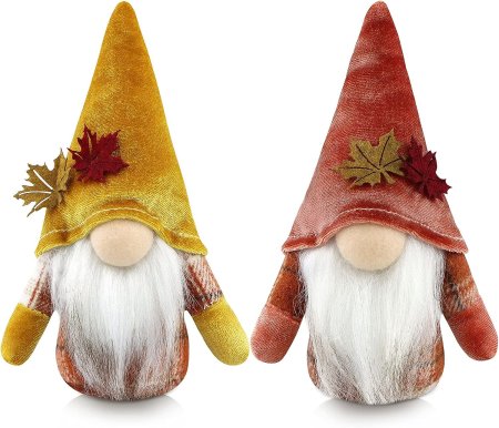two thanksgiving themed gnomes - one red hat and one with gold