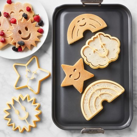 Silicone moulds in the shape of stars and rainbows to use while making pancaks